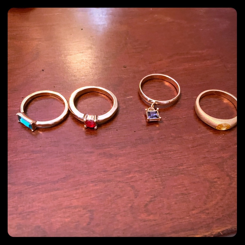 Set of 4 dainty gold colored rings
